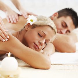 Young couple is having a back massage at the spa centre. 

[url=http://www.istockphoto.com/search/lightbox/9786786][img]http://dl.dropbox.com/u/40117171/couples.jpg[/img][/url]