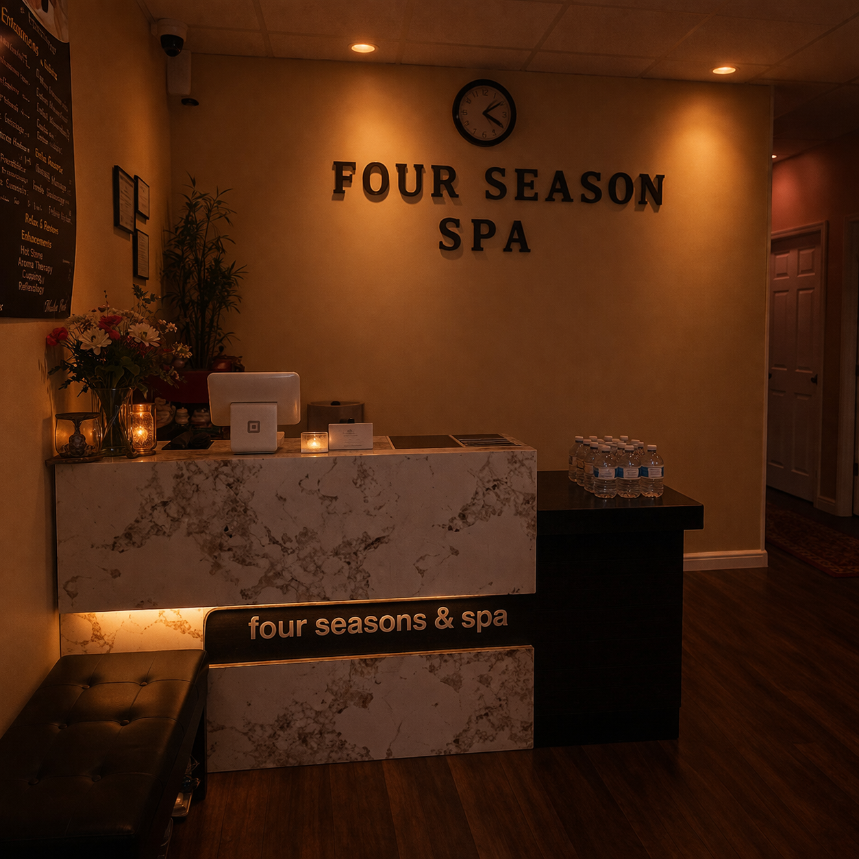 Four Seasons Spa reception desk with front counter and logo wall