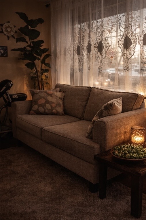 Quiet waiting lounge with sofa and window light inside Four Seasons Spa